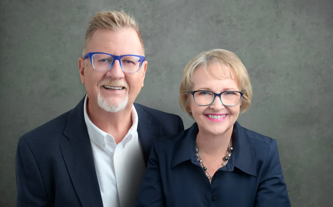 John and Sharon Musker, smiling together